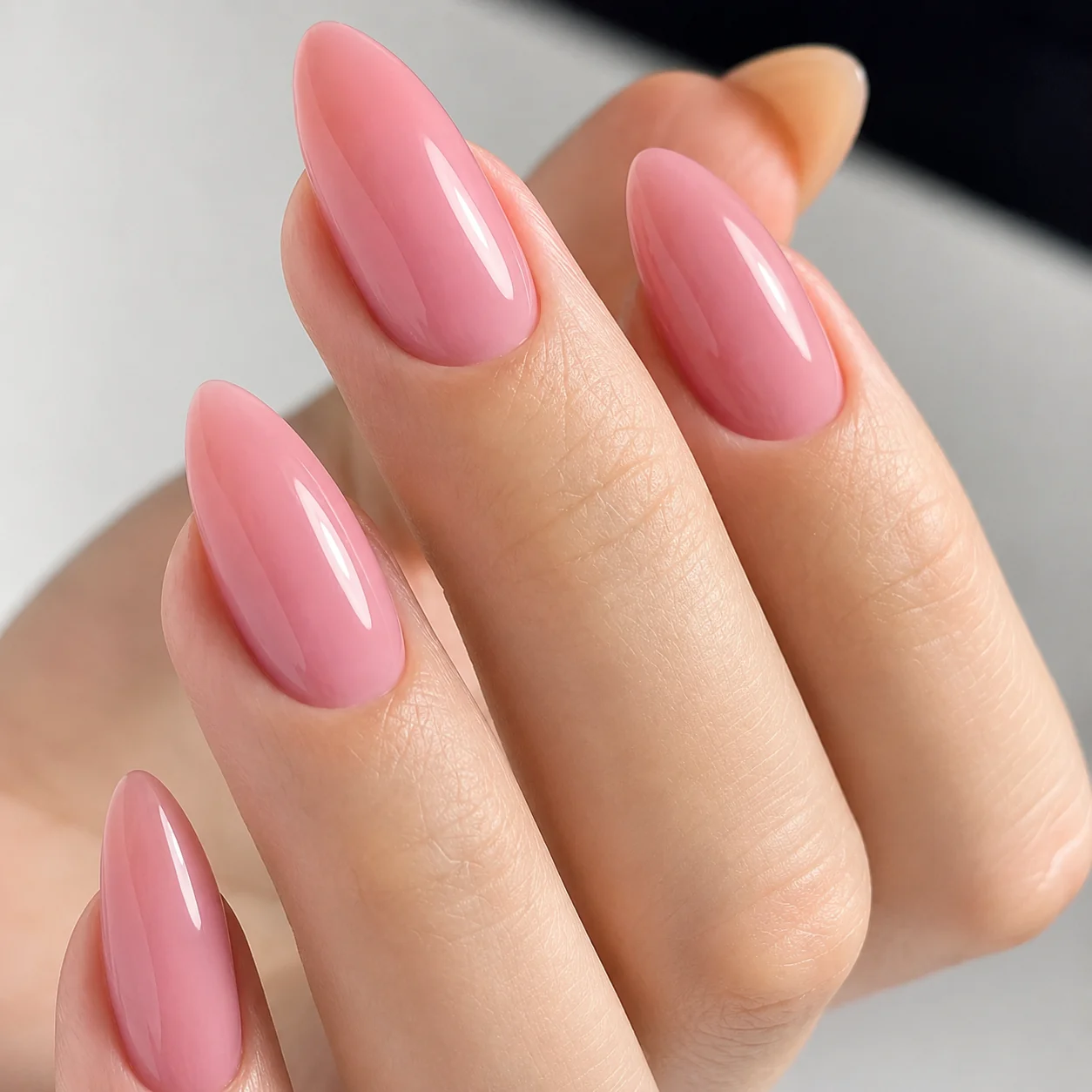 Glossy blush pink almond nails